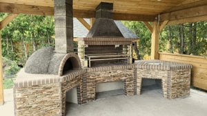 Outdoor Stone Kitchen With Firebrick Pizza Oven and Large